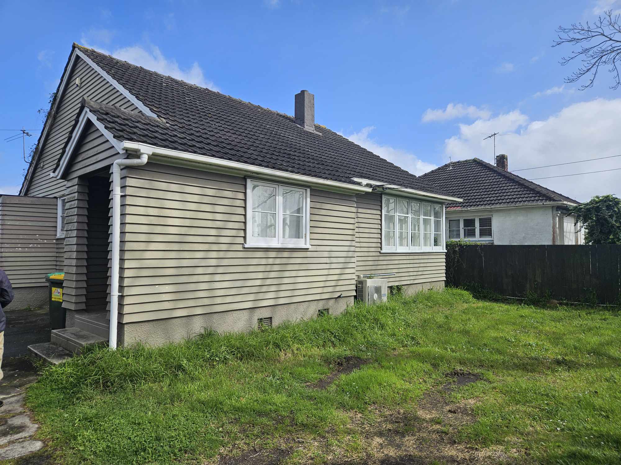 House exterior before asbestos cladding removal